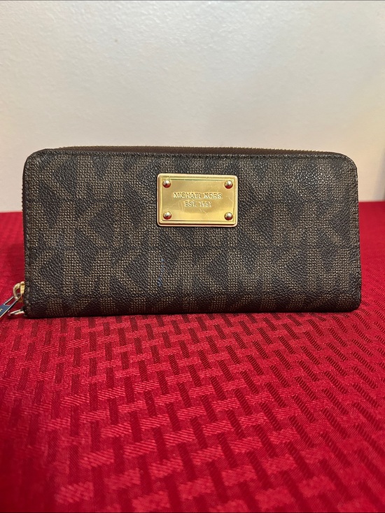 Michael Kors Handbags - Michael Kors Brown Monogram Zip Wallet with Gold Plaque
